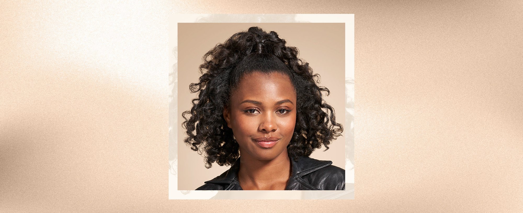 A woman with a curly hairstyle